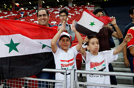 אוהדי נבחרת סוריה. ניצחונות הנבחרת מציירים את המשטר של אסד כמדינה חילונית ומתפקדת