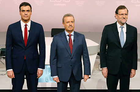 מימין - ראש ממשלת ספרד מריאנו ראחוי, משמאל - פדרו סאנצ'ס, מנהיג המפלגה הסוציאליסטית