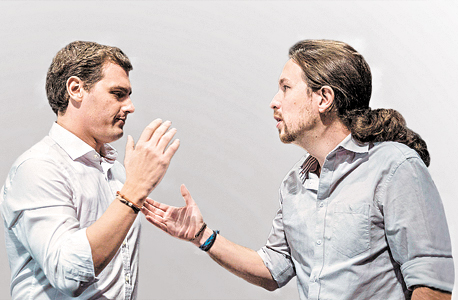 פבלו איגלסיאס מנהיג פודמוס ואלברט ריברה מנהיג סיודדניוס