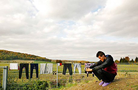 פליט בגרמניה. ב-2015 נכנסו ליבשת כמיליון פליטים, צילום: אם סי טי