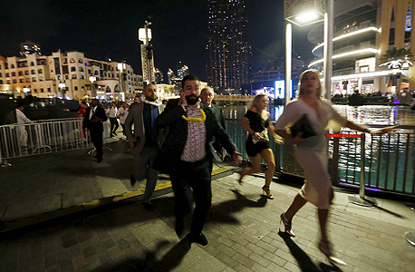 הפינוי מהמלון בדובאי לאחר השריפה, צילום: רויטרס