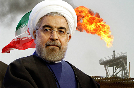 נשיא איראן רוחאני על רקע באר נפט
