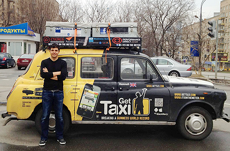 Gett CEO Shahar Waiser in front of a company taxi in Russia. Photo: Nimrod May Gett CEO Shahar Waiser in front of a company taxi in Russia. Photo: Nimrod May