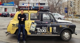 Gett CEO Shahar Waiser in front of a company taxi in Russia. Photo: Nimrod May