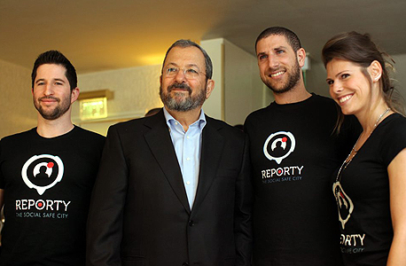 Ehud Barak with the founders of Reporty, which was rebranded as Carbyne. Photo: Amit Sha'al