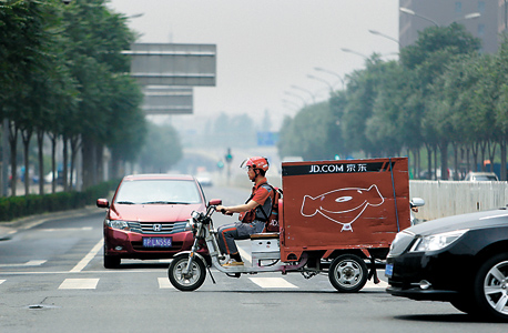 JD.com founder Liu Qiangdong delivering merchandise