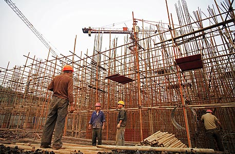 אתב בנייה בסין. הענף הוא אחד ממנועי הצמיחה המרכזיים במדינה