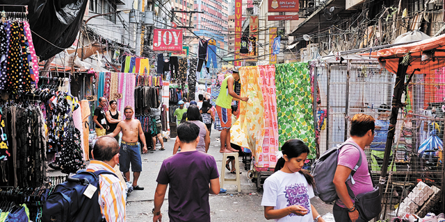 שוק במנילה, הפיליפינים. האינפלציה מעודדת את הצריכה, צילום: בלומברג