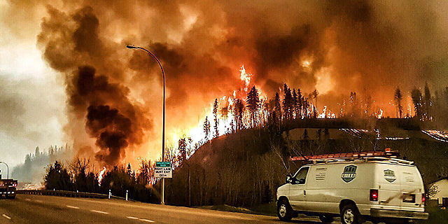 שריפת הענק בקנדה, בשבוע שעבר, צילום: אי פי איי