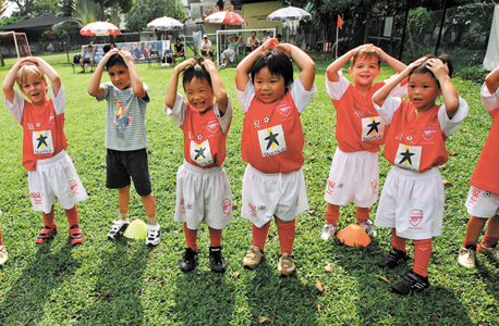 ילדים בסינגפור, צילום: אי פי איי