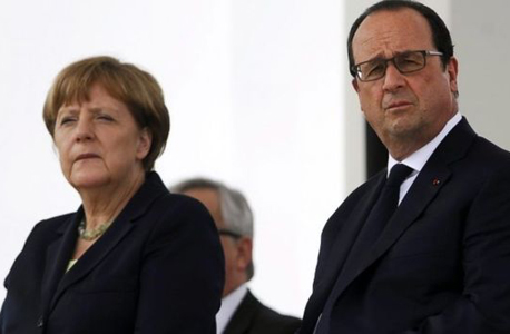 פרנסואה הולנד נשיא צרפת ואנגלה מרקל קנצלרית גרמניה מודאגים 