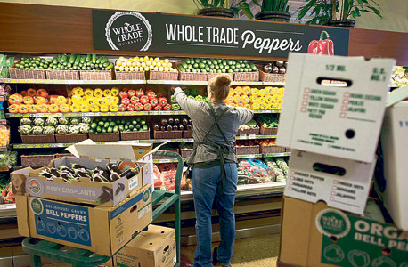 סניף של ענקית המזון האורגני Whole Foods. הפכה את Instacart לאפליקציית המשלוחים הרשמית, צילום: בלומברג