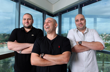 NSO founders Shalev Hulio, Avi Rosen, and Omri Lavie. Photo: Amit Sha'al