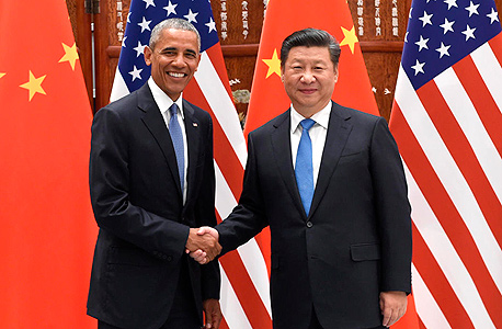 מימין נשיא סין שי ג'ינגפינג ו נשיא ארה"ב ברק אובמה., צילום: איי פי