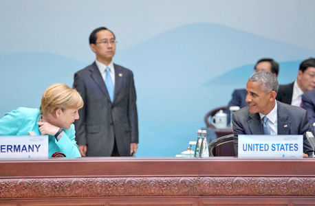 ברק אובמה ואנגלה מרקל, היום בסין. מסמך אזהרה על השלכות הברקזיט