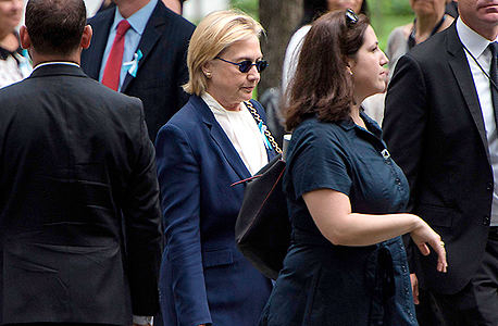הילארי קלינטון עוזבת את הטקס לזכר פיגוע התאומים לפי פרסום בפוקס היא התעלפה, צילום: איי אף פי
