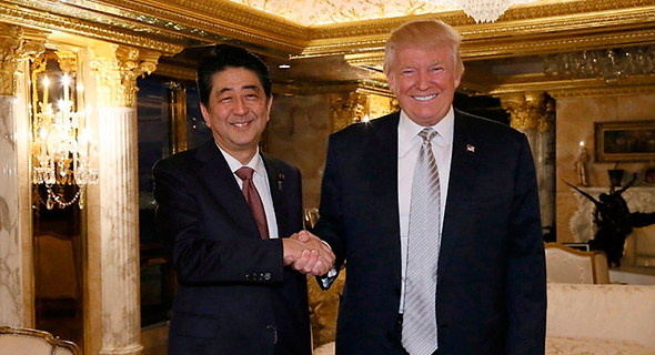נשיא ארה"ב הנבחר דונלד טראמפ בפגישה ראשונה עם שינזו אבה נשיא יפן, צילום: רויטרס