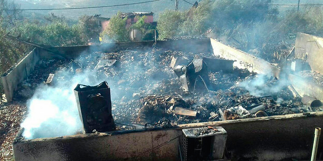 בית שנשרף בחלמיש, צילום: דוברות כב"ה מחוז יו"ש