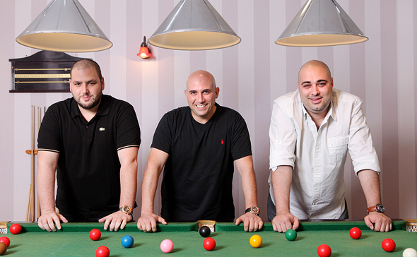 NSO founders Shalev Hulio, Avi Rosen, and Omri Lavie. Photo: Amit Sha'al