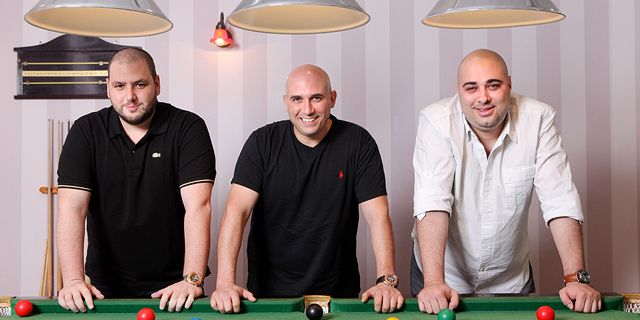 NSO founders Shalev Hulio, Avi Rosen, and Omri Lavie. Photo: Amit Sha
