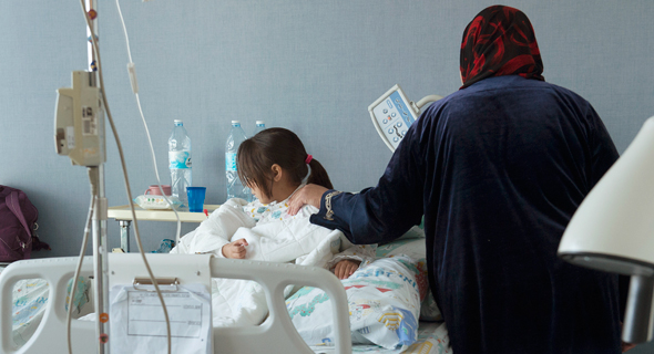 ילדה סורית בבית חולים זיו בצפת, צילום: אפי שריר