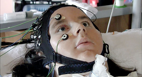 A person suffering from ALS hooked up to brain monitors to help them communicate