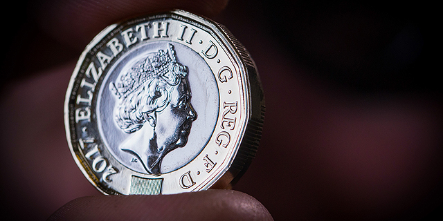 מטבע חדש של ליש"ט הושק בבריטניה, צילום: בלומברג