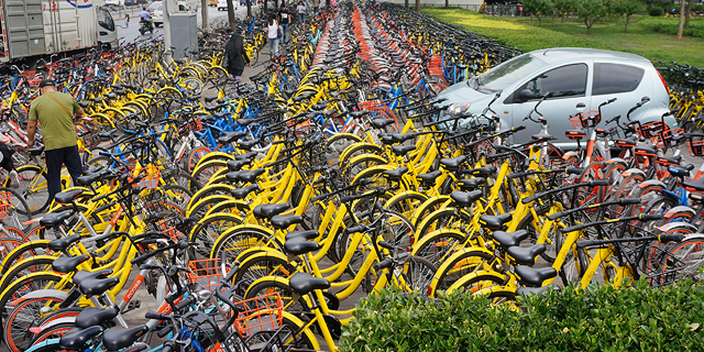 שוק שיתוף האופניים בסין דוחק את שיתוף המכוניות