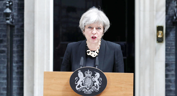 ראשת ממשלת בריטניה תרזה מיי, אתמול אחרי הפיגוע