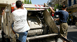 A garbage truck collecting waste. Photo: Shaul Golan