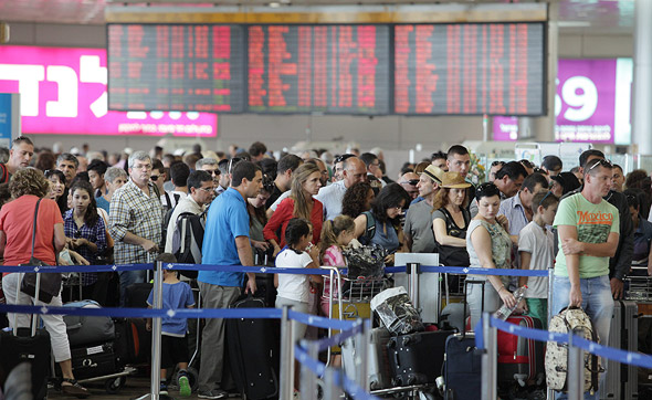 Passengers at Tel Aviv's Ben Gurion airport. Photo: Orel Cohen  