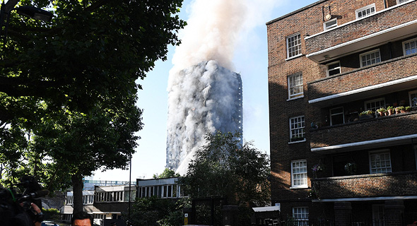 השריפה במגדל בלונדון, צילום: אי פי איי