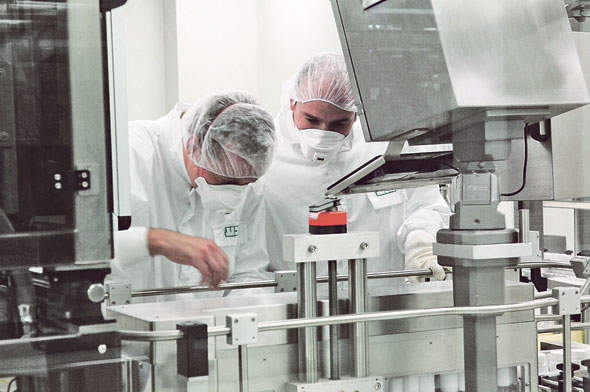 Workers at a Teva laboratory