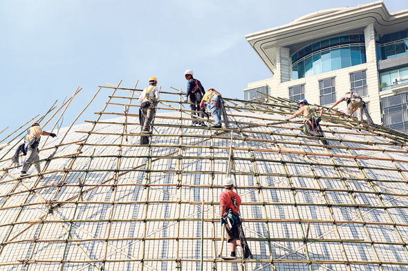 פועלי בניין סינים, צילום: שאטרסטוק