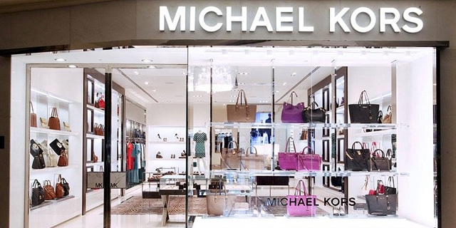 חנות של תיקי מייקל קורס. ירידה במכירות, צילום: cpp-luxury