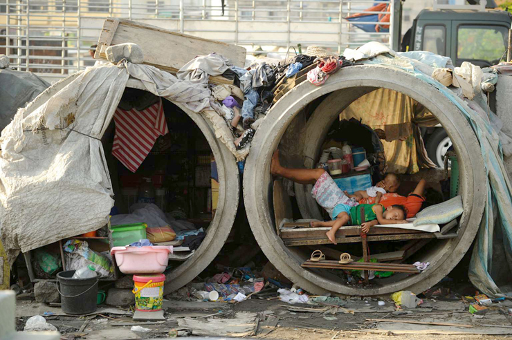 חסרי בית בפיליפינים, צילום:AFP