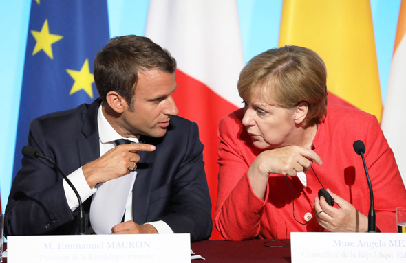 מימין: קנצלרית גרמניה אנגלה מרקל וראש ממשלת צרפת עמנואל מקרון