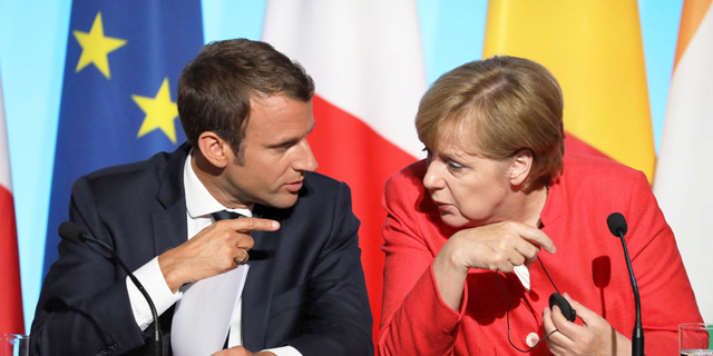 מימין: קנצלרית גרמניה אנגלה מרקל וראש ממשלת צרפת עמנואל מקרון, צילום: איי אף פי