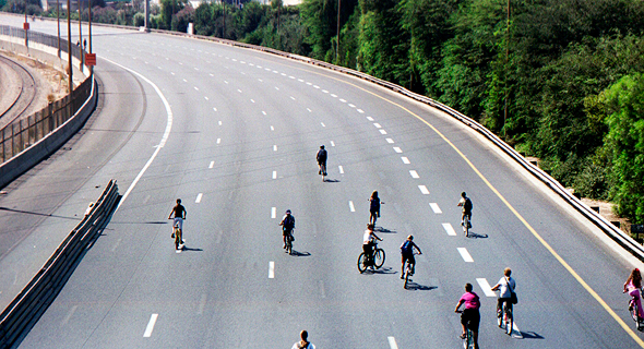 Bike riders on a highway in Israel