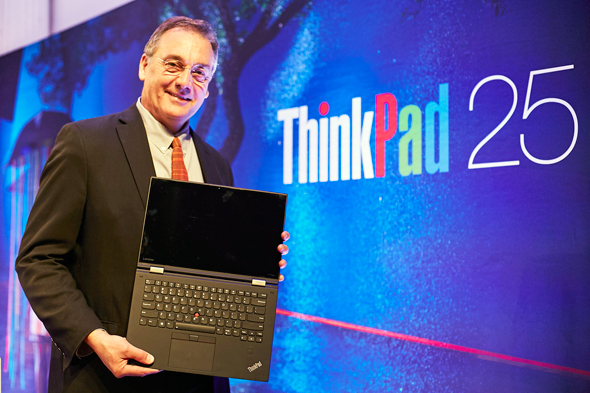 Lenovo Chief Design Officer David Hill presenting a laptop