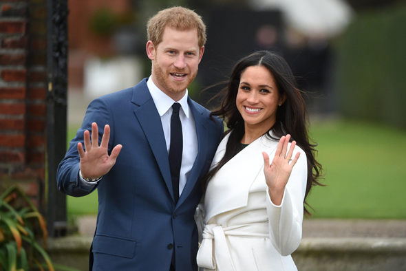 Duchess Meghan Markle (right) and her husband Prince Harry. Photo: EPA