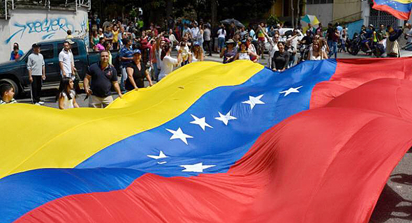 הפגנה בונצואלה נוכח המשבר הכלכלי הקשה במדינה, צילום: גטי אימג
