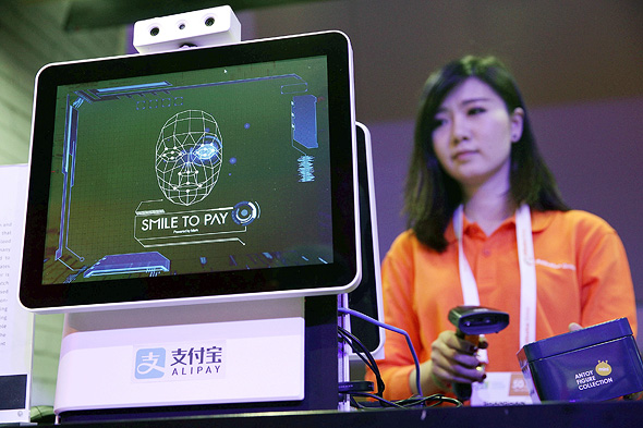 A facial recognition payment station by Alipay. Photo: AFP