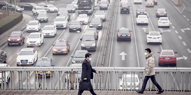 כלי רכב בסין שמזהמים את האוויר, צילום: בלומברג