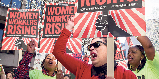 צעדת יום האשה בוושינגטון, לפני שנה, למען זכויות לנשים עובדות. האפליה פחתה, הנשים המריאו , איור: איי אף פי