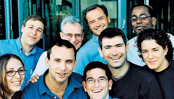 Naftali Bennett (bottom row, second from the left) with the Cyota team Photo: Naftali Bennett&#39;s Facebook page