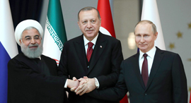 Iranian President Rouhani, Turkish President Erdoğan, and Russian President Putin. Photo: AFP