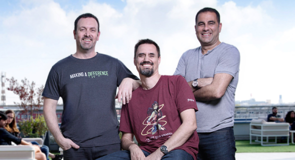 JFrog&#39;s co-founders Yoav Landman (left),  Frederic Simon (middle), and Shlomi Ben Haim (right). Photo:: Shachar Maor