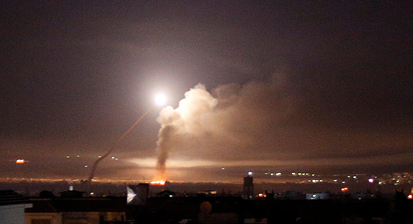 An anti-aircraft system firing at Israeli jets in Syria overnight. Photo: Reuters