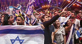 Fans cheering for Netta Barzilai. Photo: Reuters 
